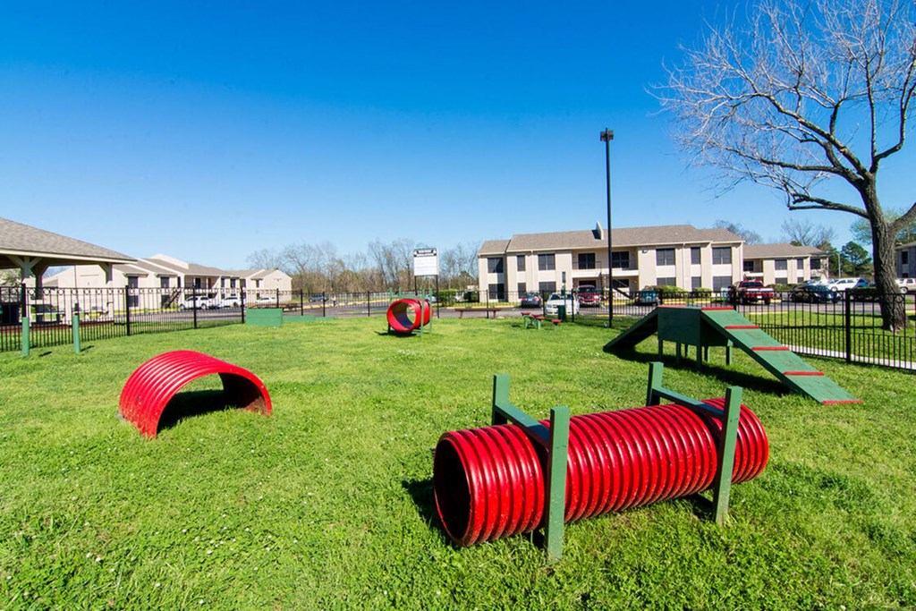 our apartments have a dog park with agility courses
