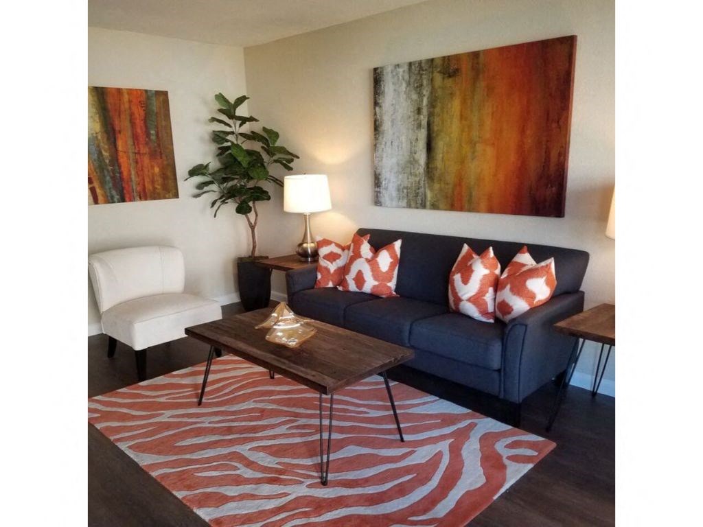 a living room with a couch and a coffee table