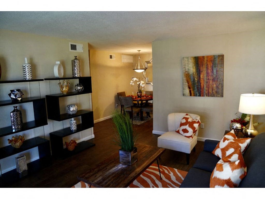 a living room with a couch and a chair