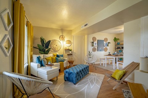 a living room with a couch and a table