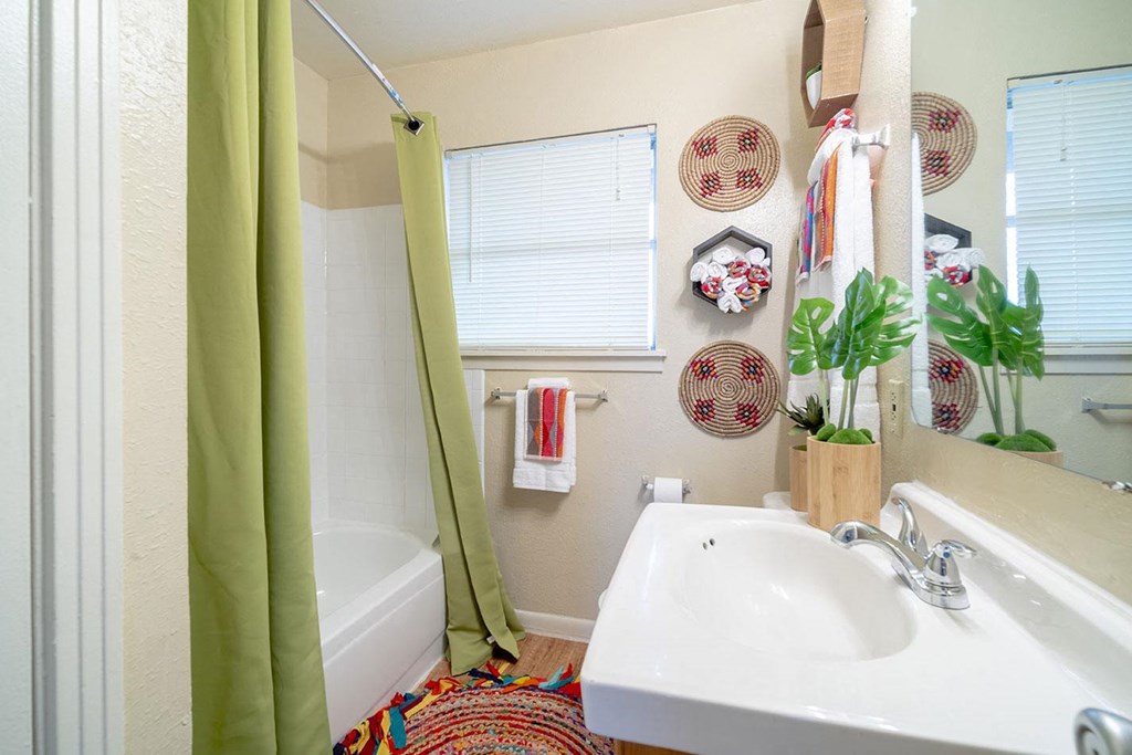 a bathroom with a sink and a bathtub
