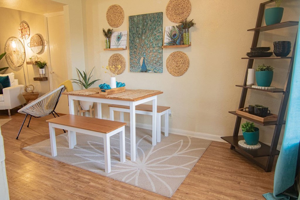 a dining room with a table and benches