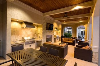 a living room filled with furniture and a fire place