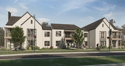 A row of modern houses with people walking in front.