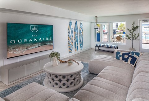 a living room with a couch and a table