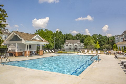 our apartments have a resort style pool with lounge chairs