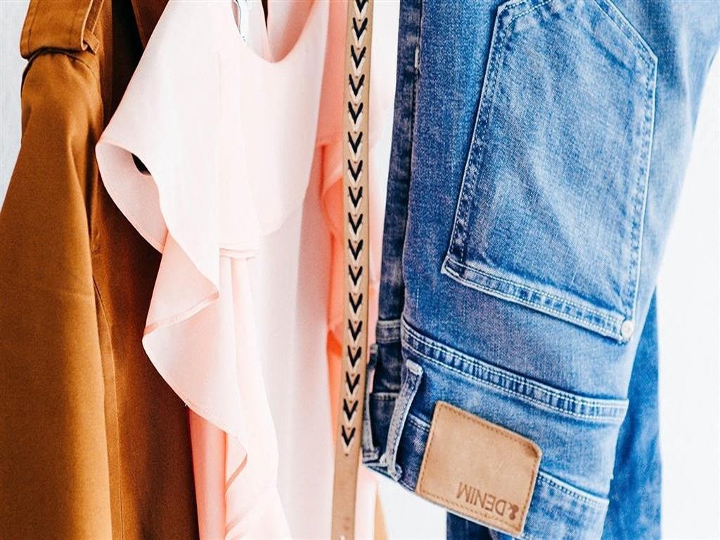 a pair of jeans and a shirt and a tie