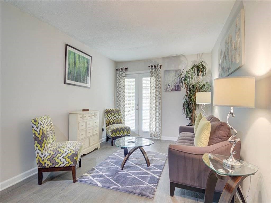 a living room with a couch and a table