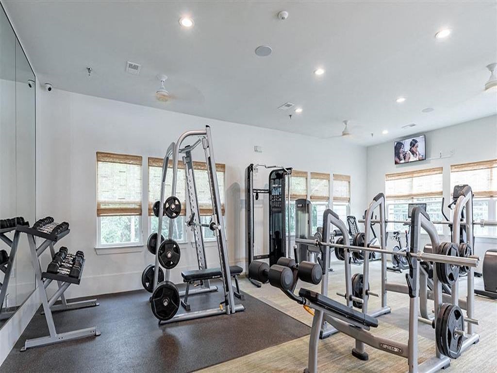 the gym is equipped with weights and cardio equipment
