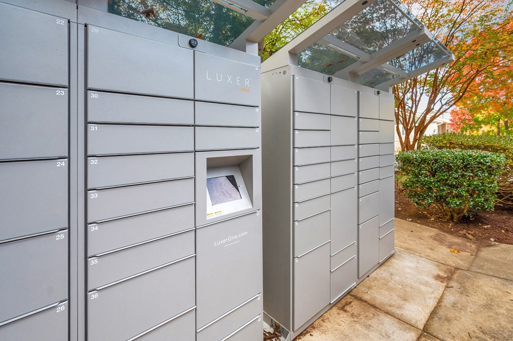 a privacy wall with a mailbox on the side of a building