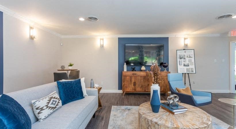 a living room with a couch and a table