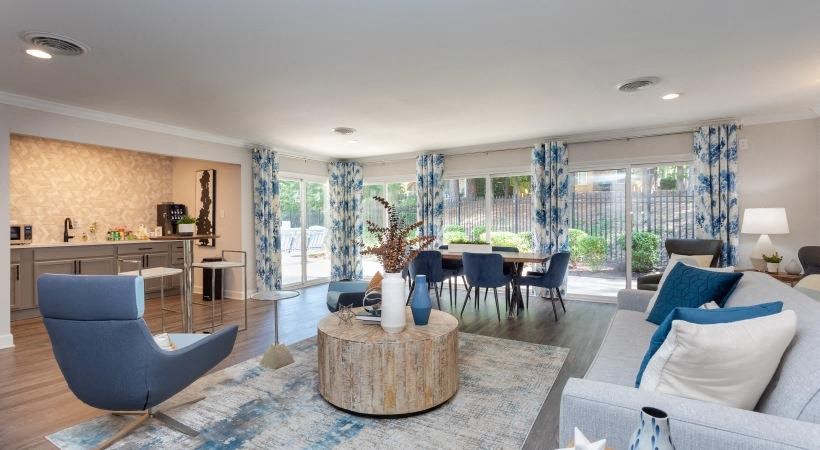 a living room with a couch and a table