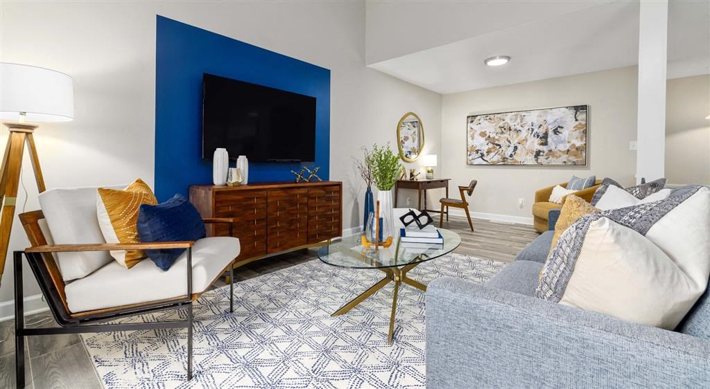 a living room with a couch and a television