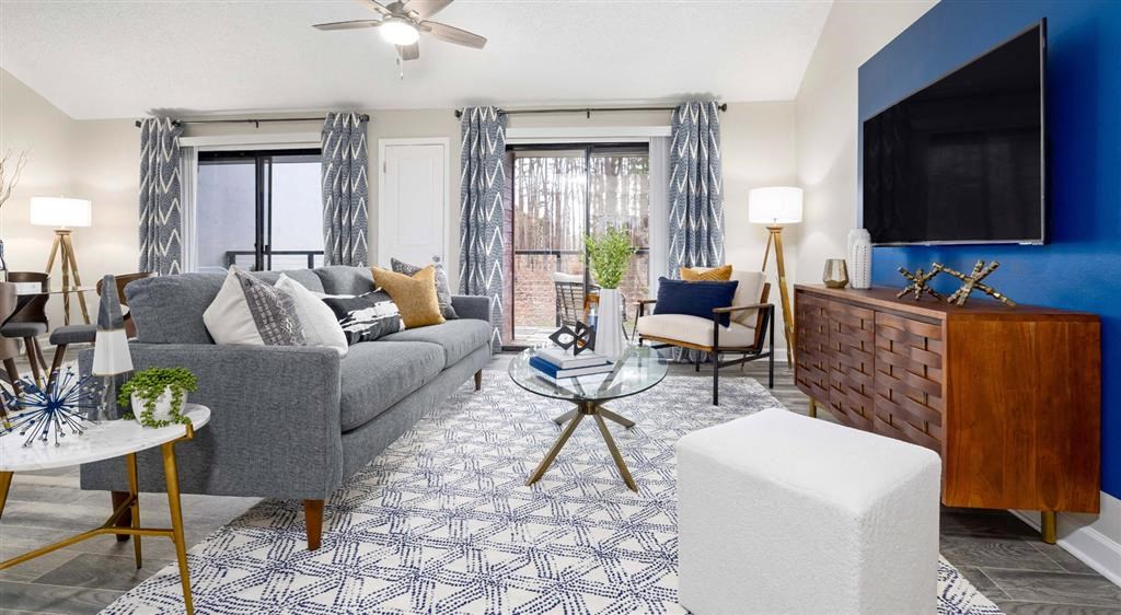 a living room with a couch and a television