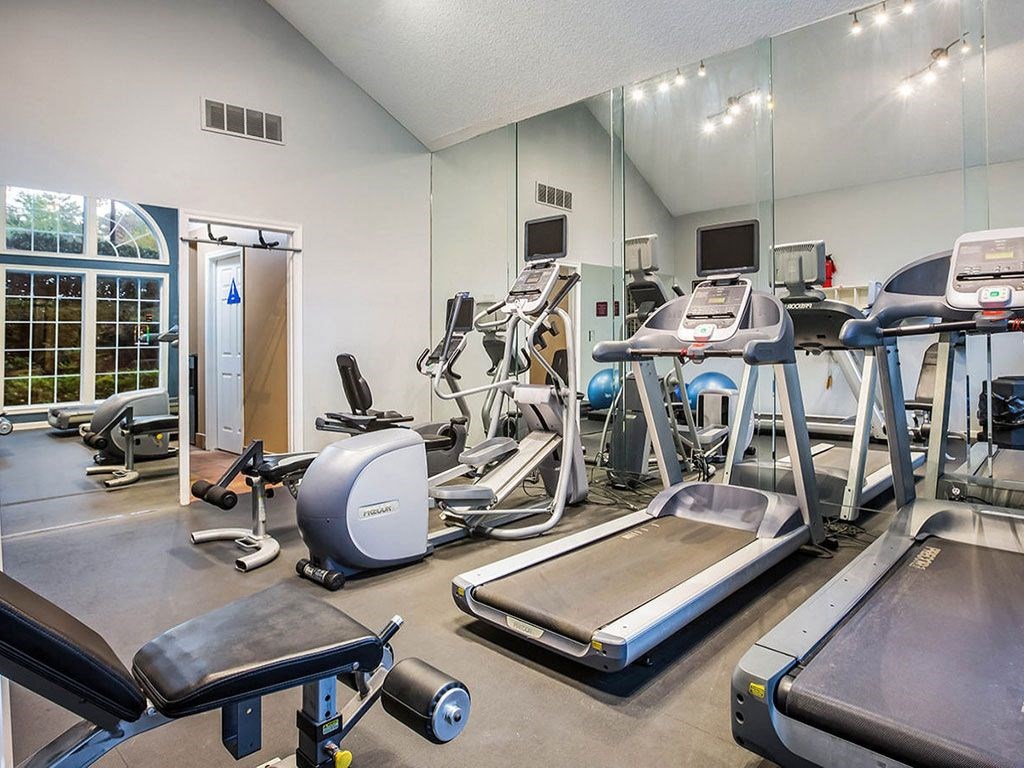the gym at the preserve at polo towers has a variety of exercise equipment