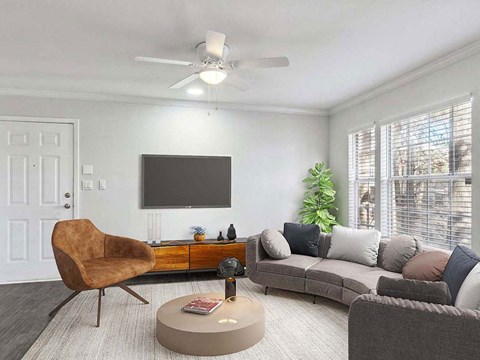 a living room with a couch and a television