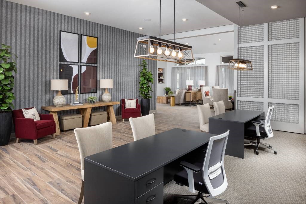 a conference room with a table and chairs