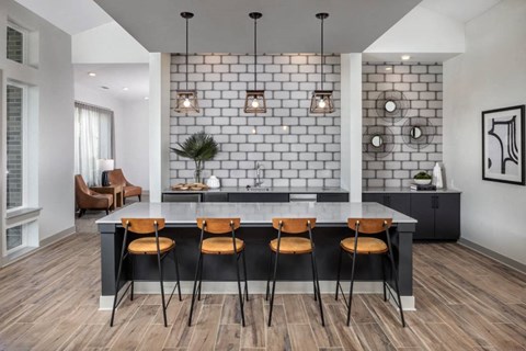 a group of tables and chairs in a room
