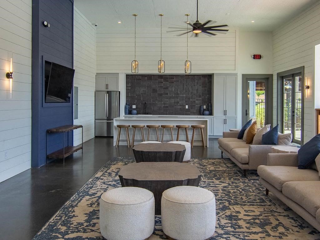 a living room with a couch and a table