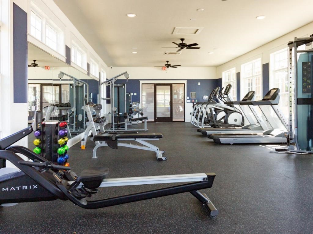 a rendering of an airport terminal with green and red lights
