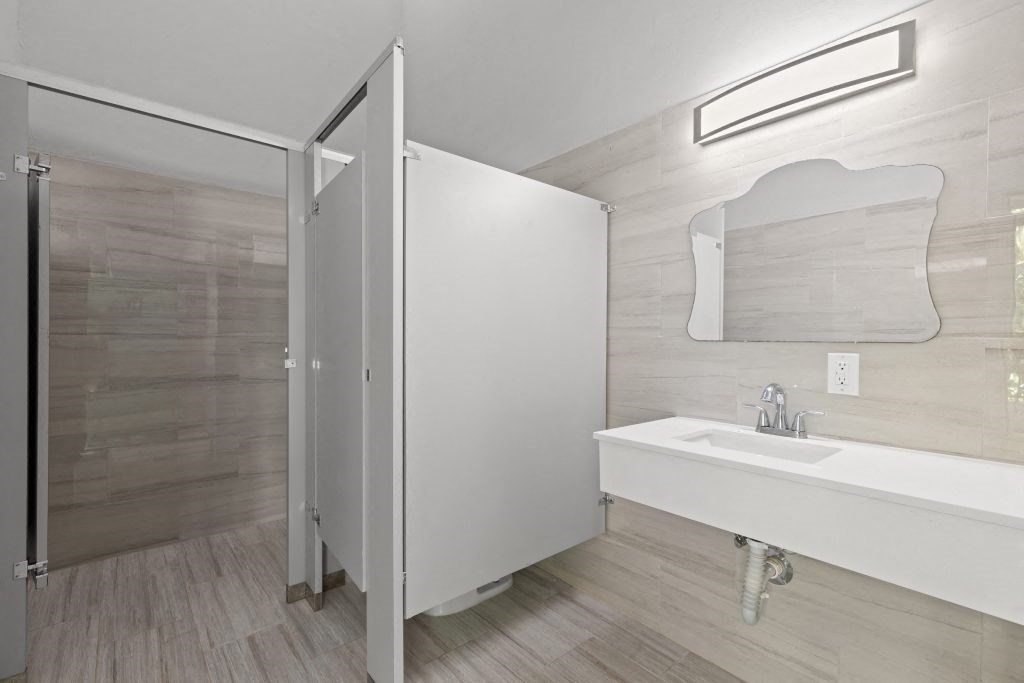 a bathroom with a sink and a shower