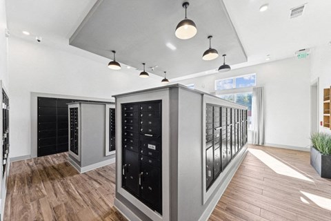 the tasting room has a large array of wine racks and a wood floor