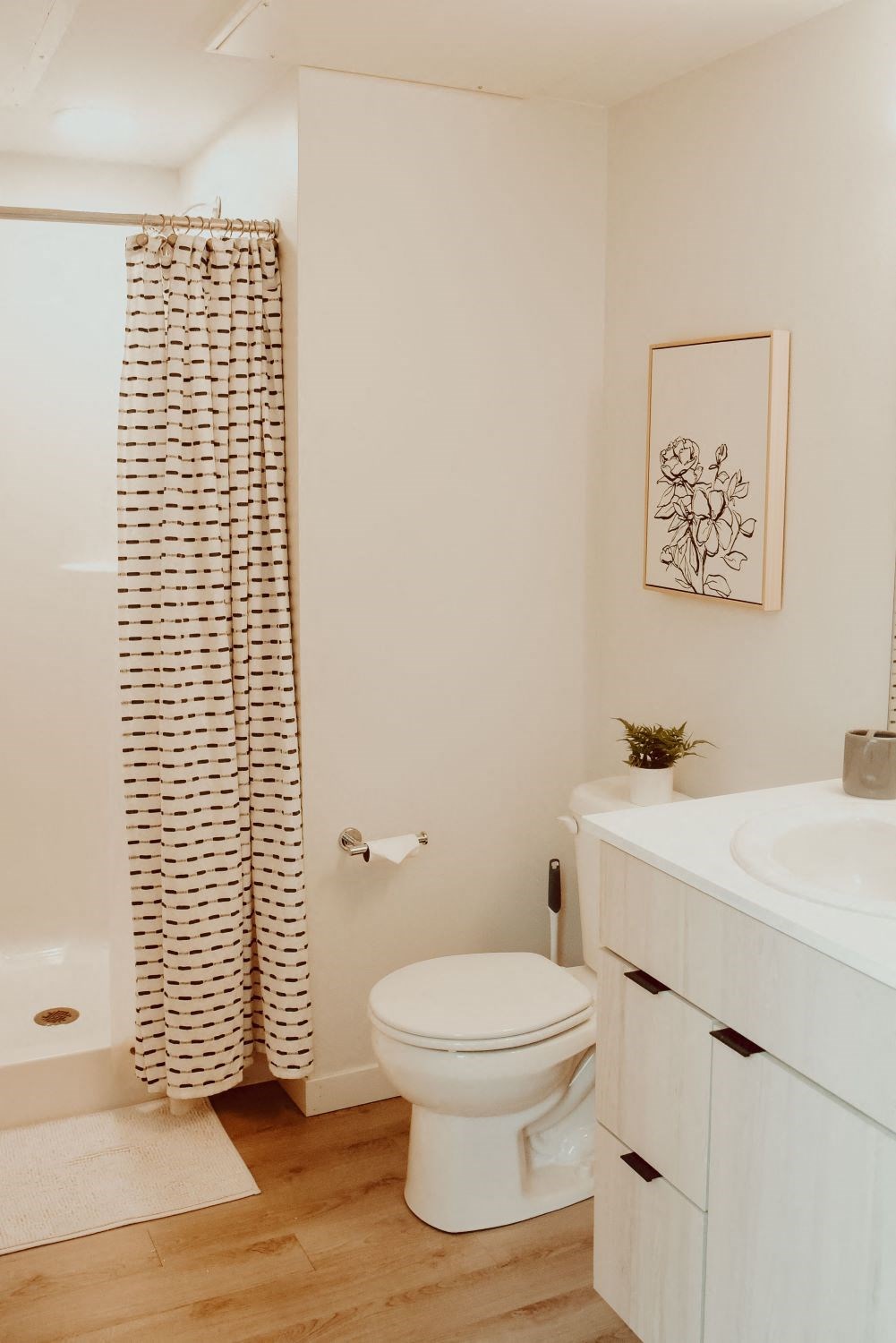 a small bathroom with a toilet and a shower