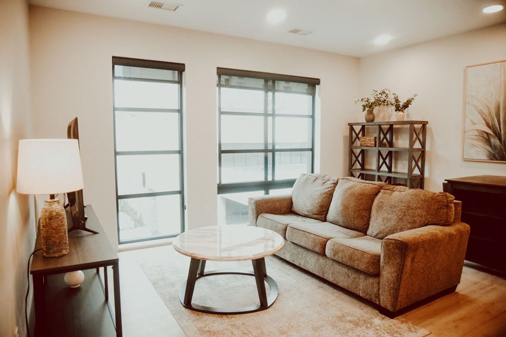 a living room with a couch and a coffee table