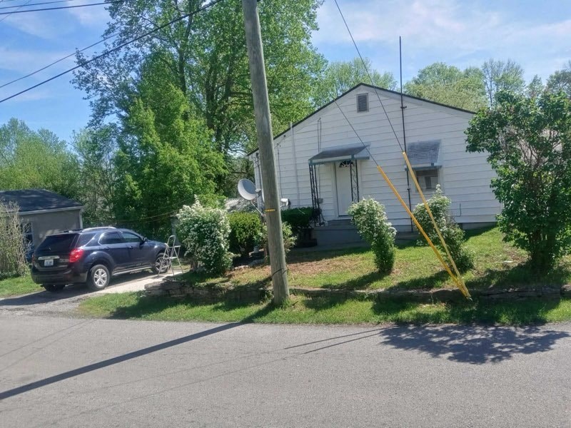 a house with a car parked in front of it
