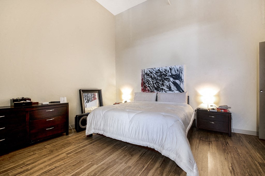 Denver Building Housing Furnished Bedroom with 16 ft Ceilings