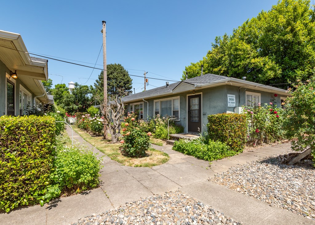 A residential area with a house and a garden.