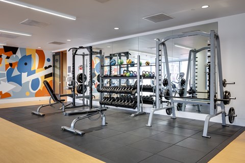 Fitness center with weight training equipment at Park Avenue West Apartments, Portland, Oregon