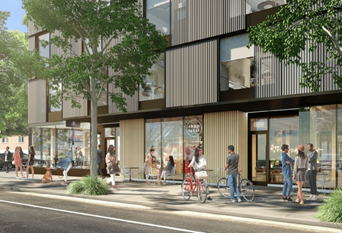 Ground floor retail storefronts with outdoor plaza at Kaya Camilla Apartments, Portland, 97217