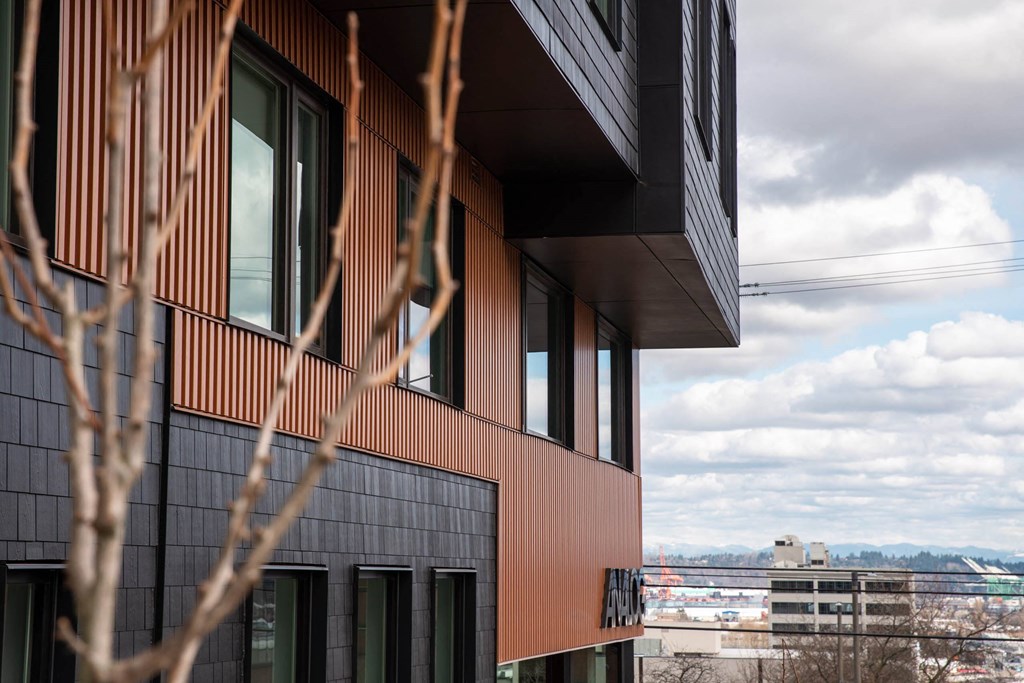 a view of the corner of a building with a city in the background at Analog Tacoma, Tacoma, WA, 98402