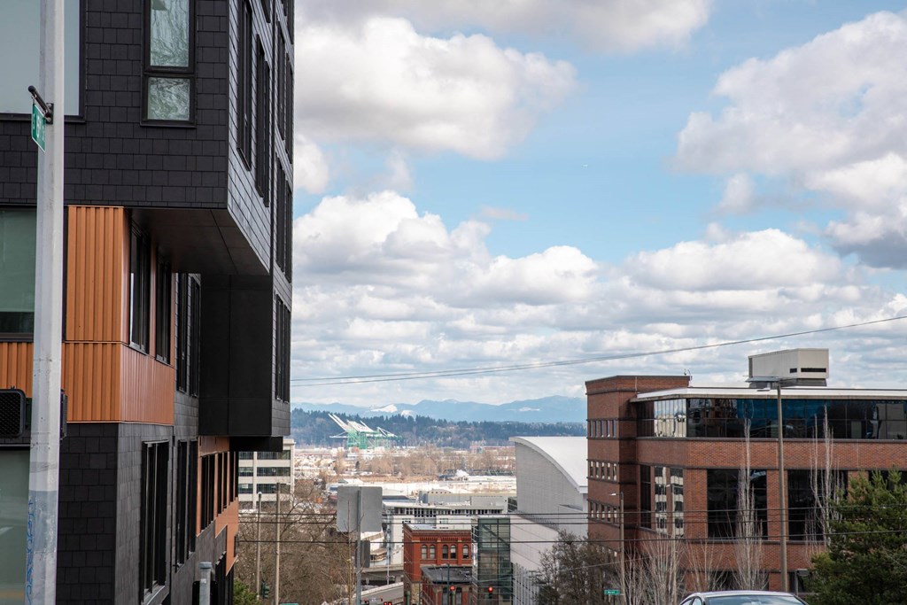a view of the city and mountains from a building at Analog Tacoma, Tacoma, 98402