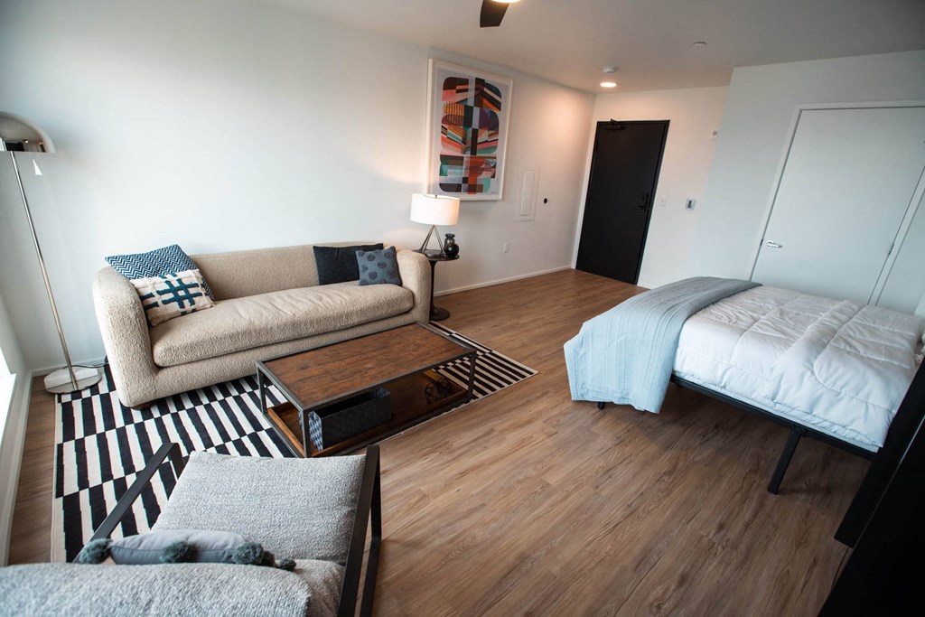 a living room with a couch and a bed at Analog Tacoma, Washington