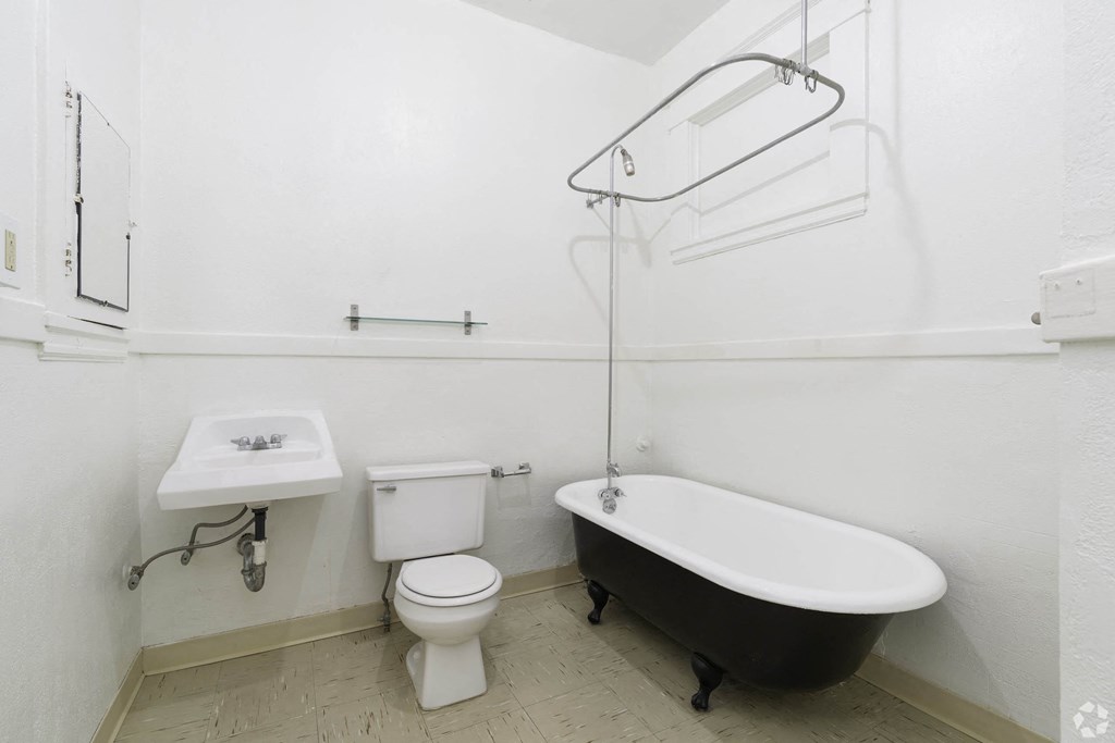 a bathroom with a sink toilet and a bath tub at Clay & Tiffany, Portland, OR, 97201