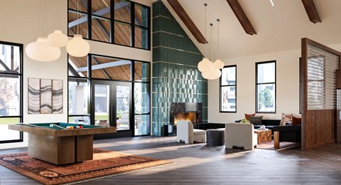 A billiard table is in the middle of a room with a fireplace and a couch.