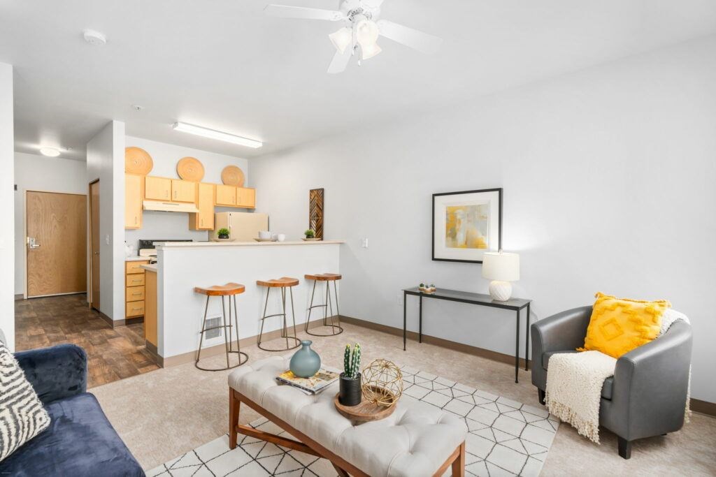 Living Room With Kitchen View at Fifth Avenue Place Apartments, Portland, 97209