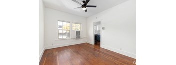 A room with a ceiling fan  at Midtown Apartments, Portland