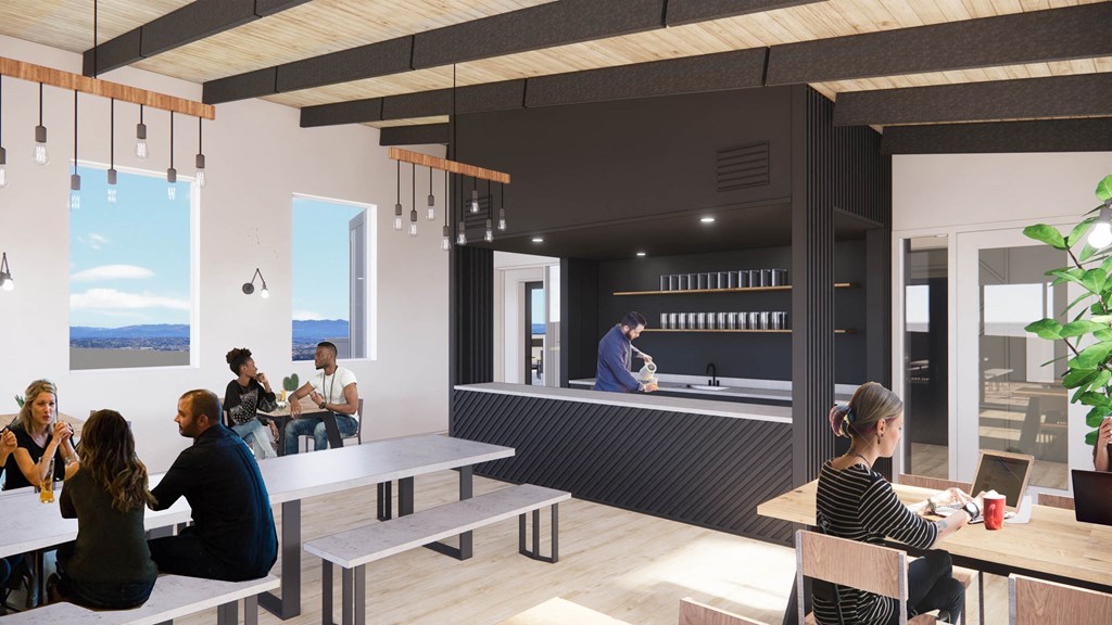 a group of people sitting at tables in a room with a glass wall with different at Moraine, Tacoma
