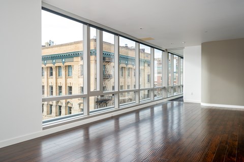 Spacious unfurnished room with floor to ceiling windows at Park Avenue West Apartments, Portland