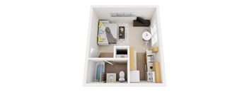 A small white room with a bed, a toilet, a sink, and a small table.