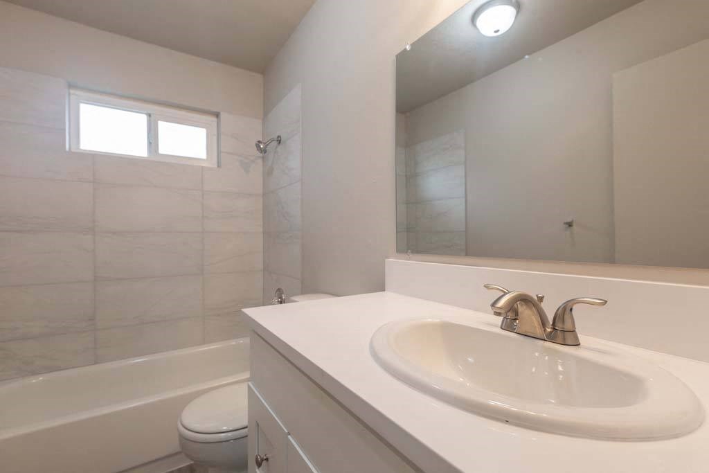 a bathroom with a sink and a toilet