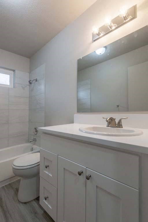 a bathroom with a sink toilet and bathtub