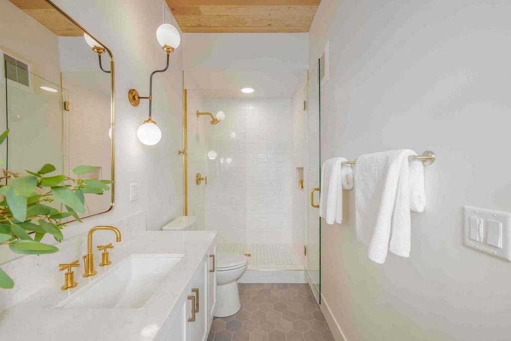 a bathroom with a sink and a toilet