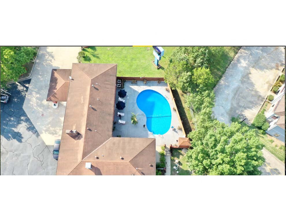 overhead view of the pool an overhead view of a swimming pool on top of a roof at Schaefer Ridge Apartments, Missouri