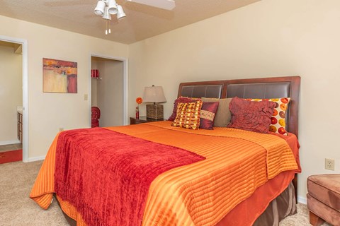 a bedroom with a bed and a ceiling fan at Arbors at Windsor Lake, Columbia, SC 29223