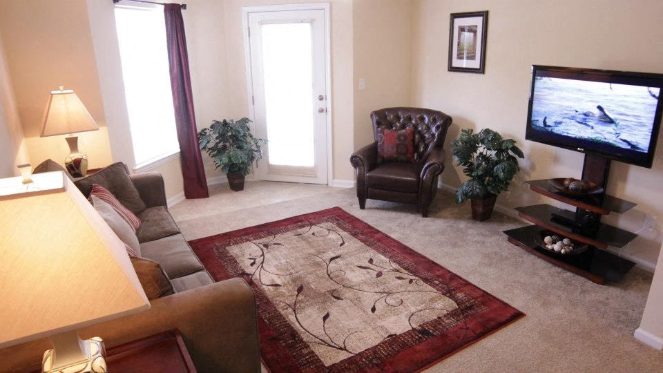 Living Room With Plenty Of Natural Light at Cross Creek Apartments, Beaufort, SC