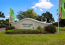 a building with a green and red flag in front of it